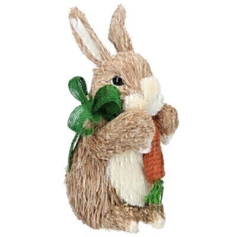 Cute bristle Easter bunny holding a carrot and wearing a lovely green bow. Ornament from designer Giesela Graham who designs unique Easter gifts and decorations. Would make a lovely Easter gift.